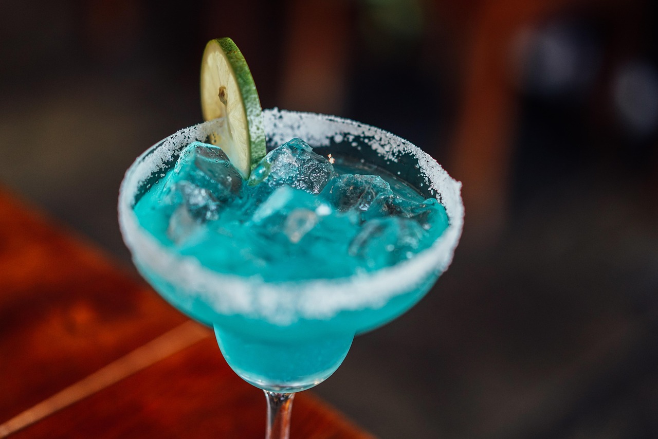 A margarita on ice in a salt-rimmed glass